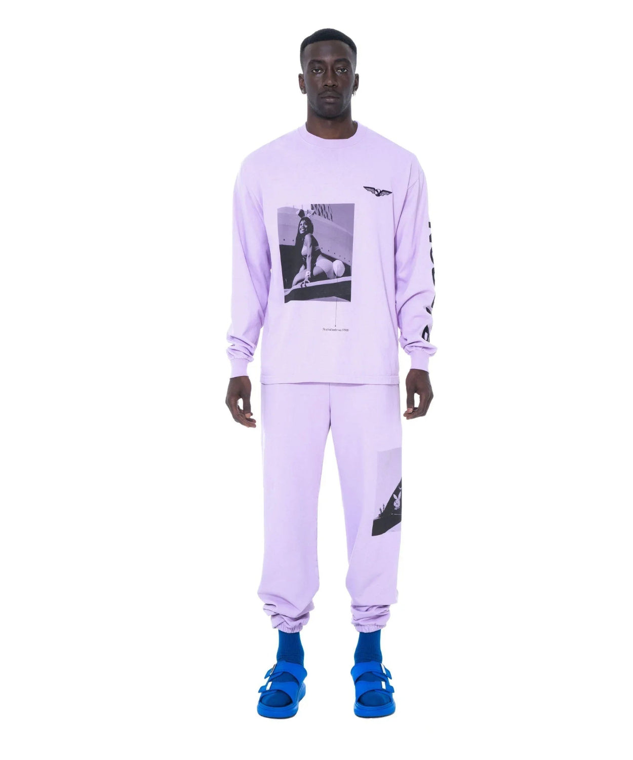 Man wearing lavender aviation graphic long sleeve t-shirt and pants set