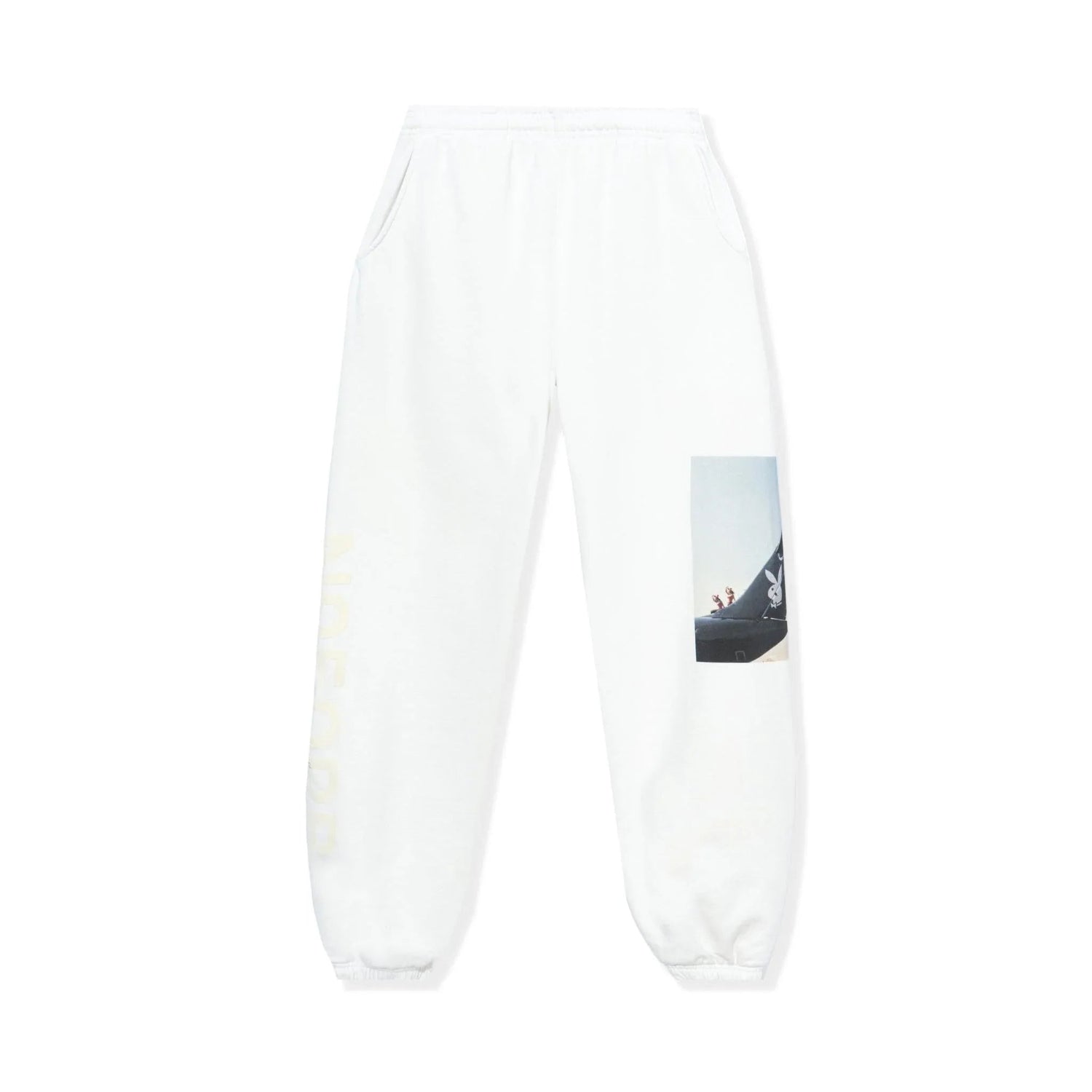 White sweatpants with aviation graphic print and side pockets, elastic waistband and cuffs.