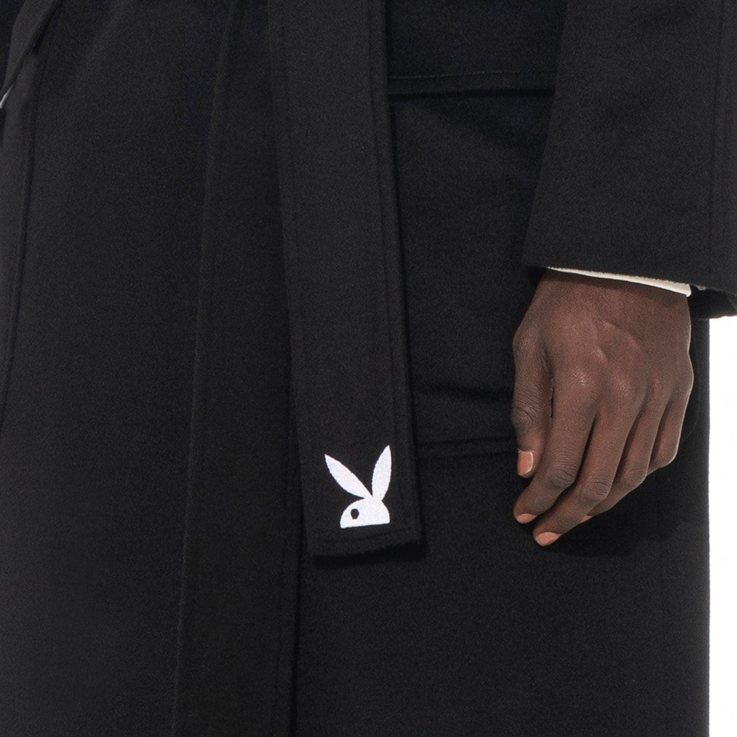 Black belted long wool robe coat with embroidered bunny logo near pocket