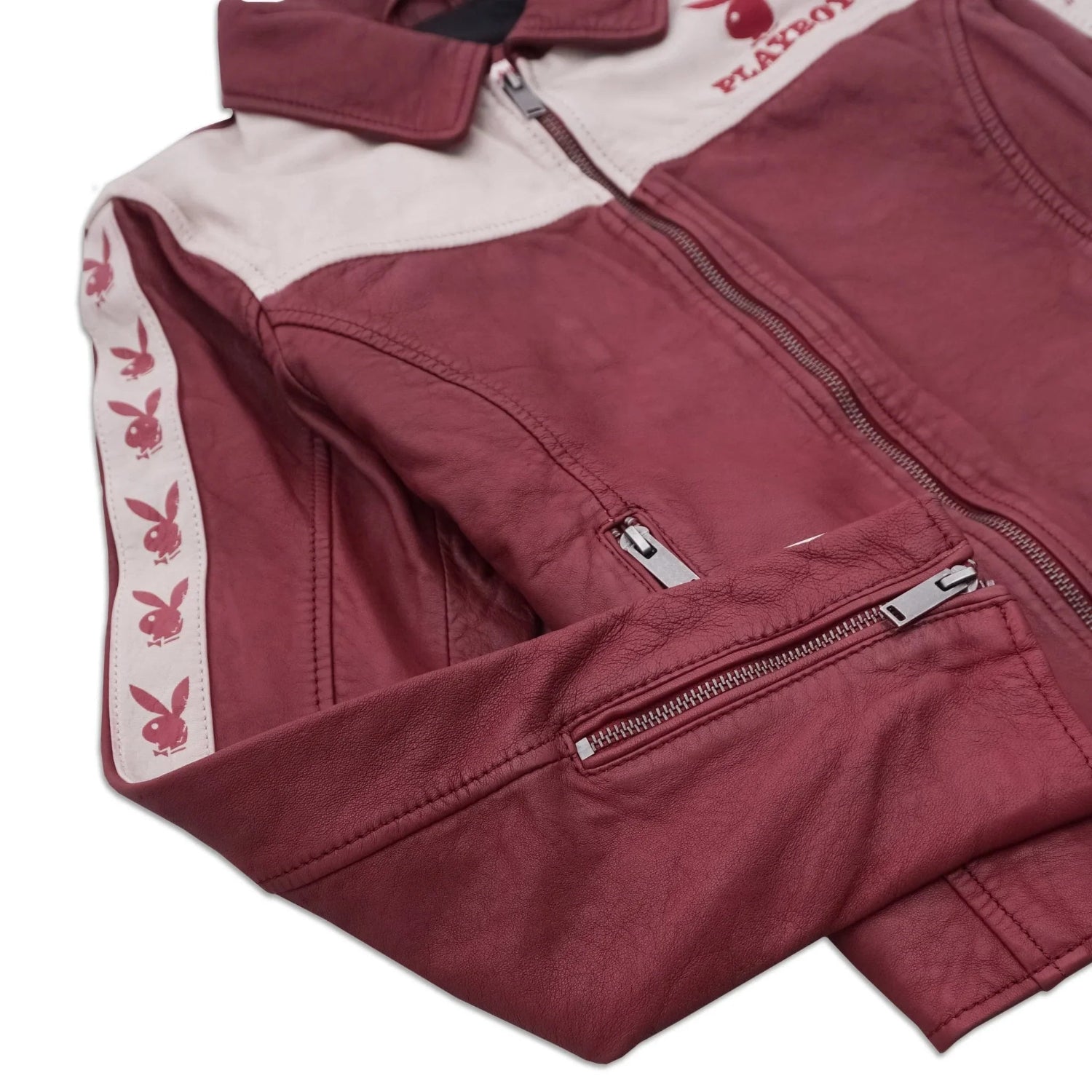 Women's maroon leather jacket with white accents, zipper pockets, and bunny logo details on sleeves
