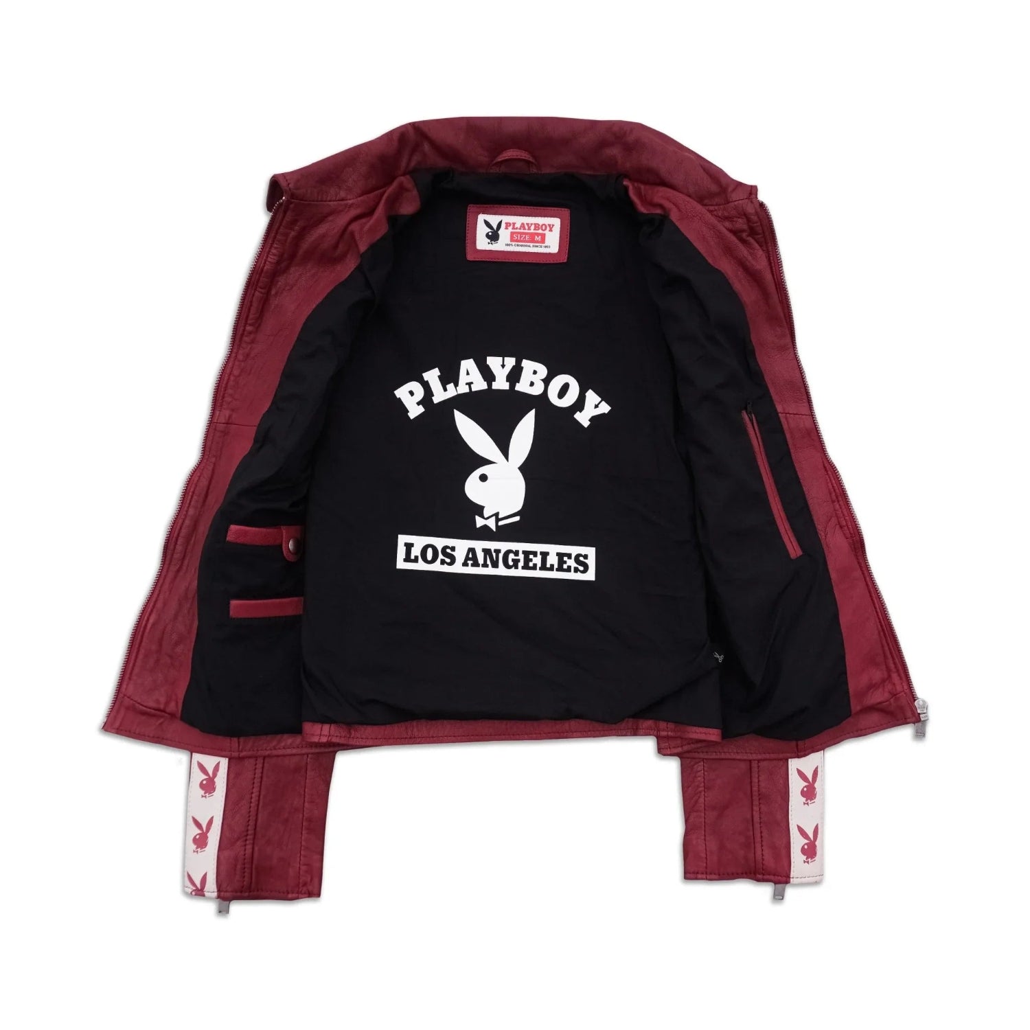 Women's red leather jacket with black lining, white Playboy Los Angeles logo inside, open view