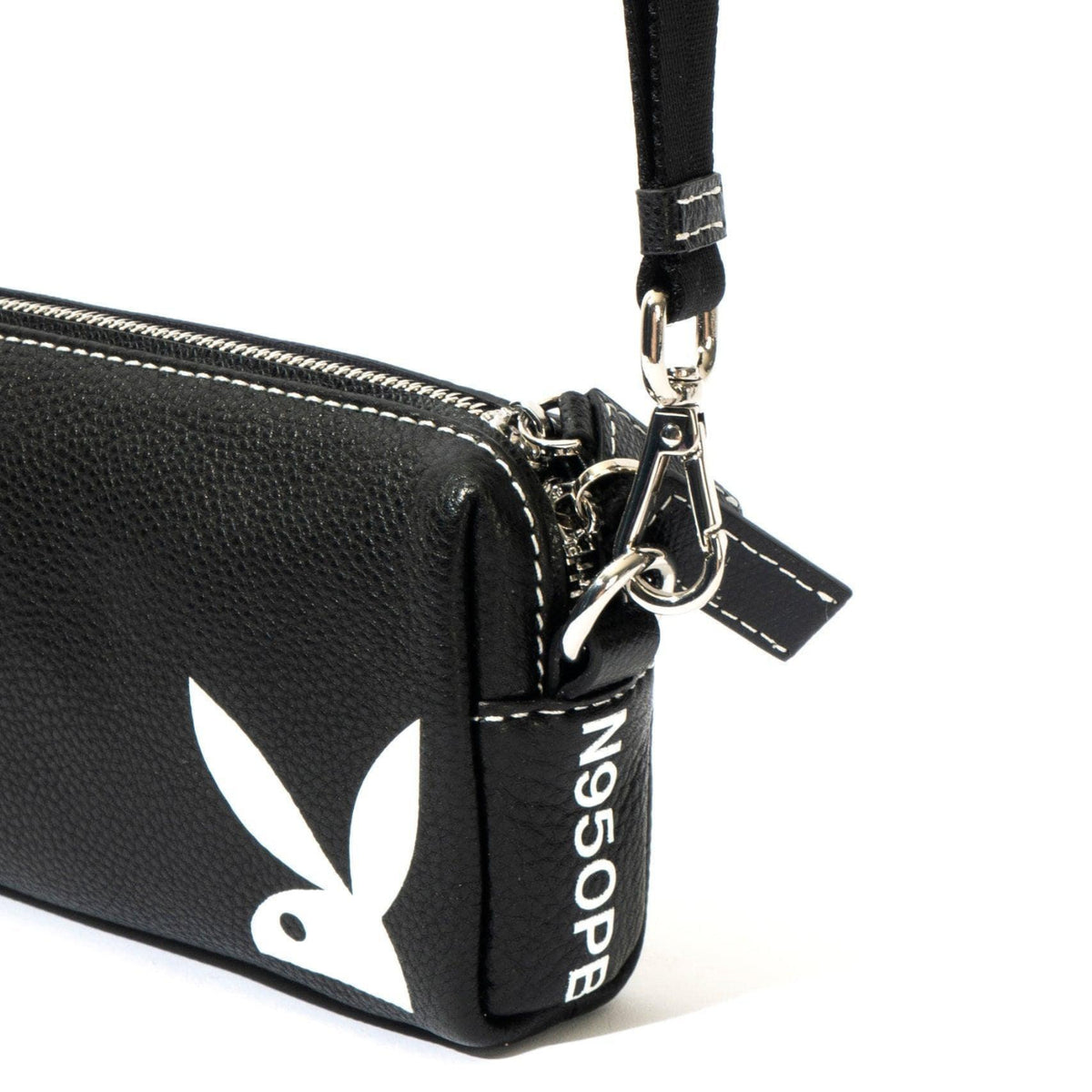 Black leather pouchette with white bunny logo, wrist strap, and silver hardware