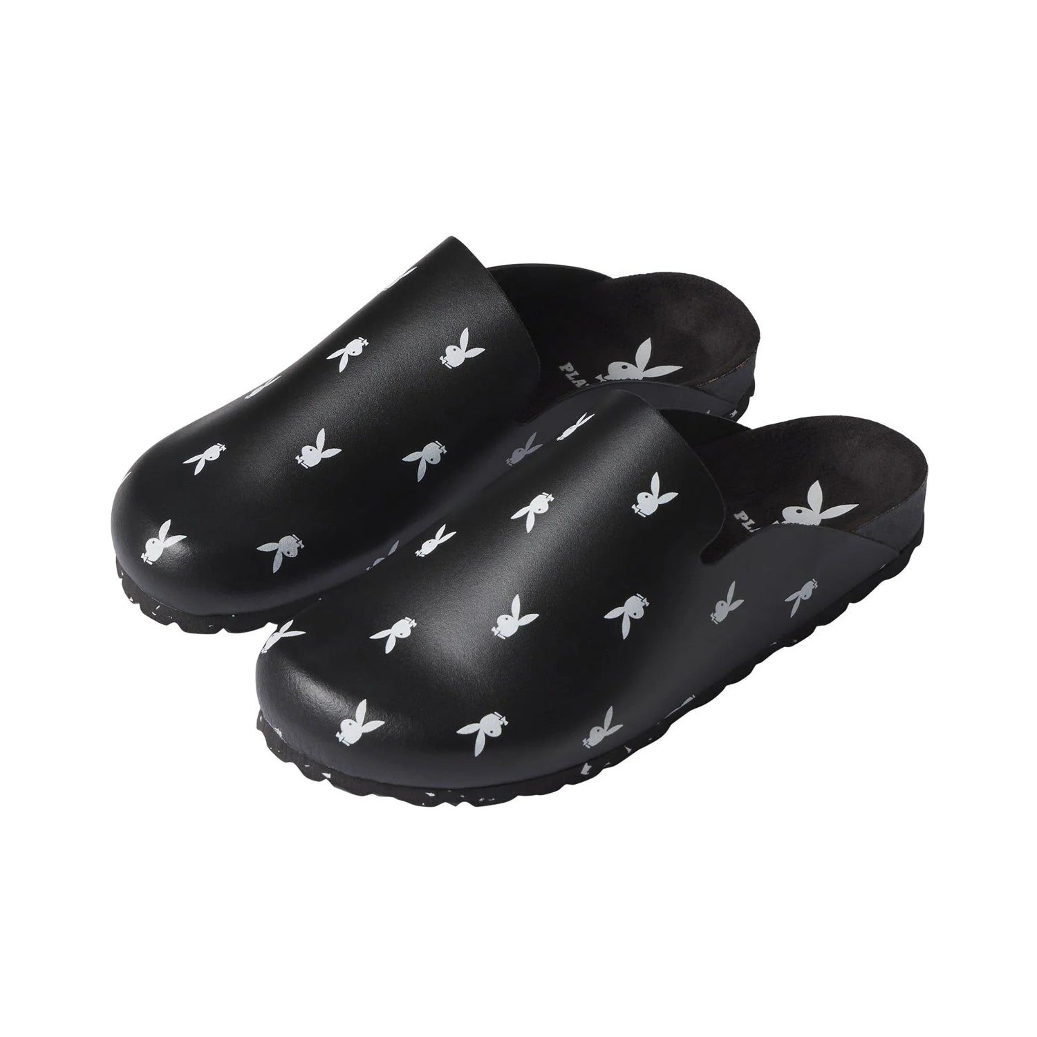 Black leather slip-on slides with white bunny logo pattern, closed toe, on white background.