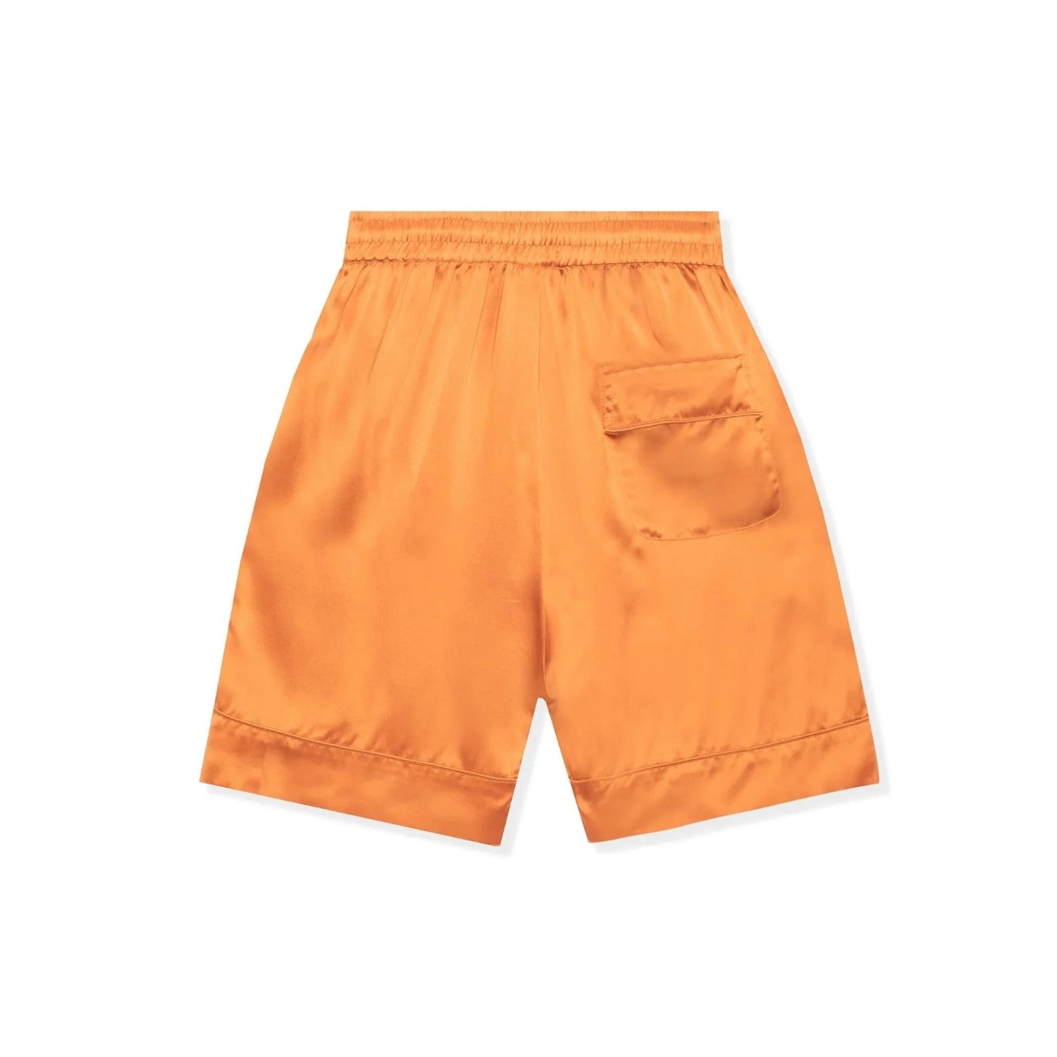 Orange silk shorts with an elastic waistband and back pocket, laid flat on white background.