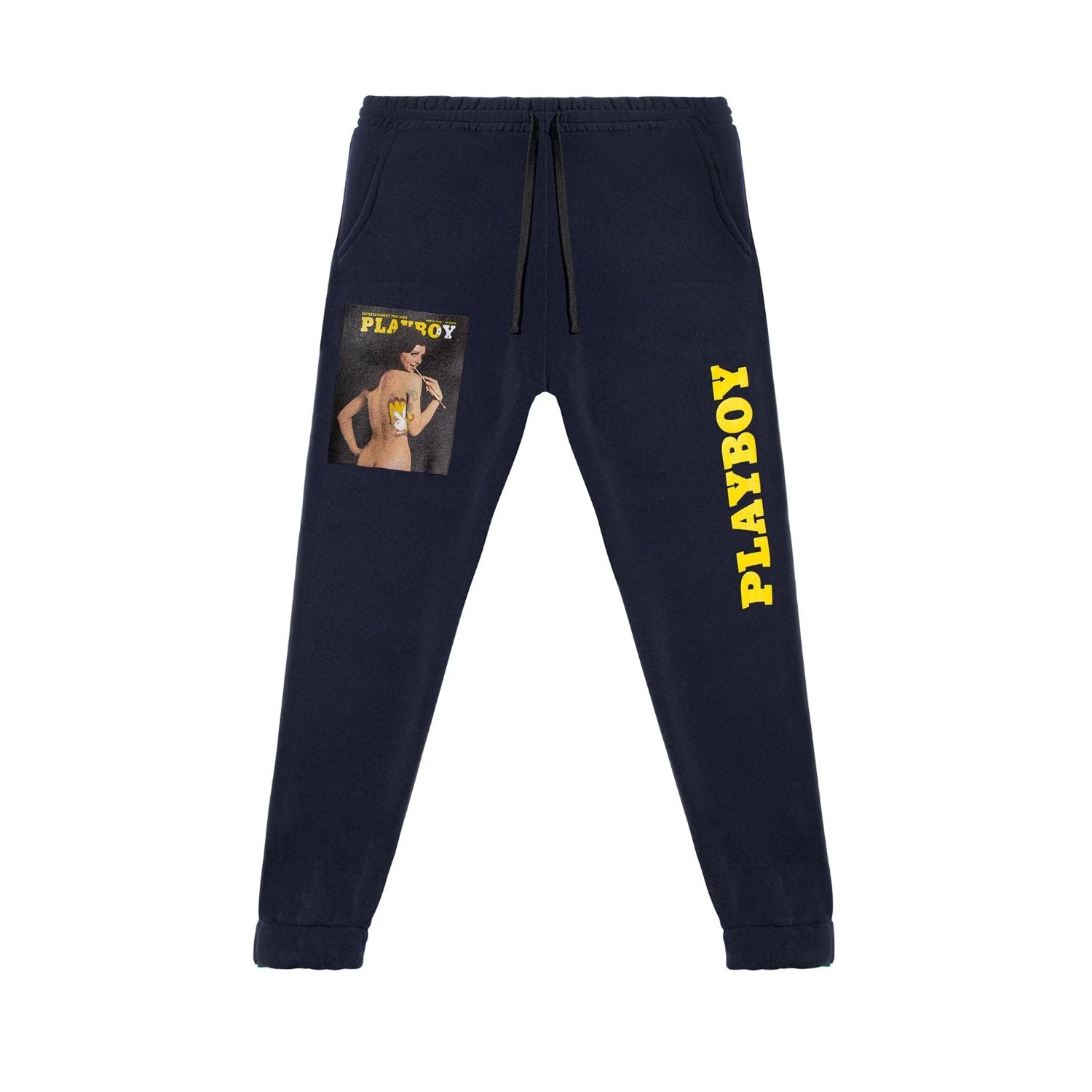 Navy jogger pants with yellow PLAYBOY text and vintage magazine cover graphic on the leg