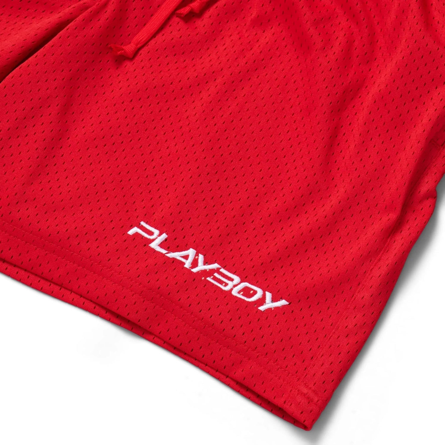 Red men's classic mesh basketball shorts with white PLAYBOY logo embroidery