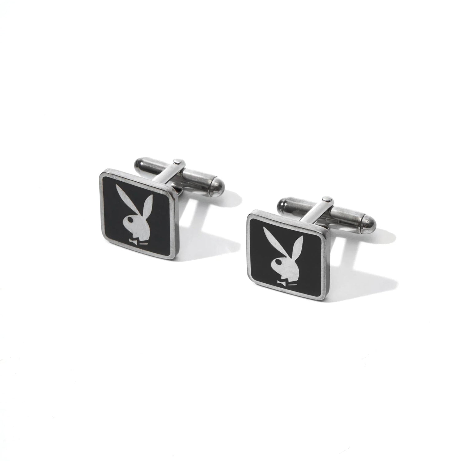 Silver men's cufflinks with black square faces featuring a rabbit head design