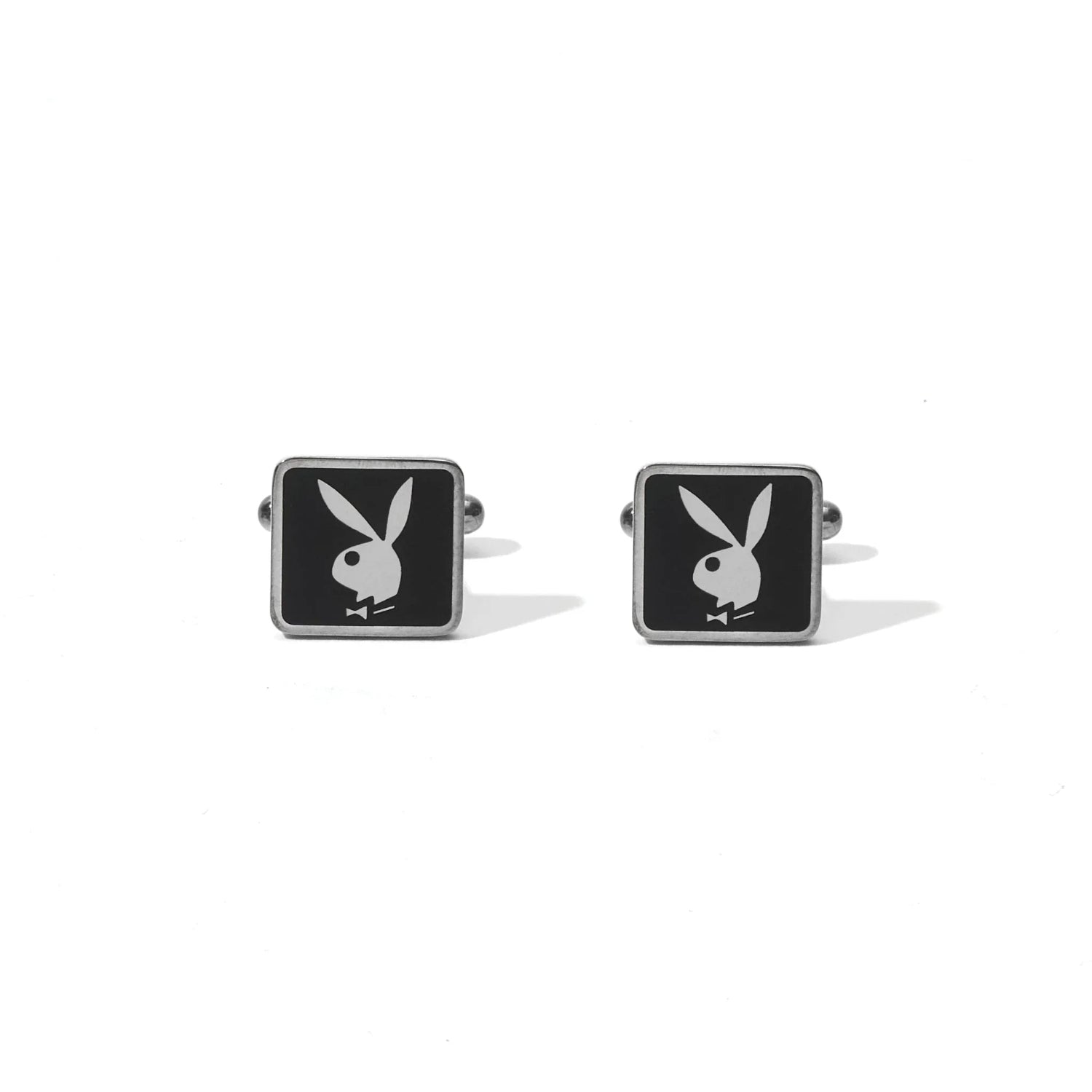 Men's silver cufflinks featuring a white rabbit head design on a black square face