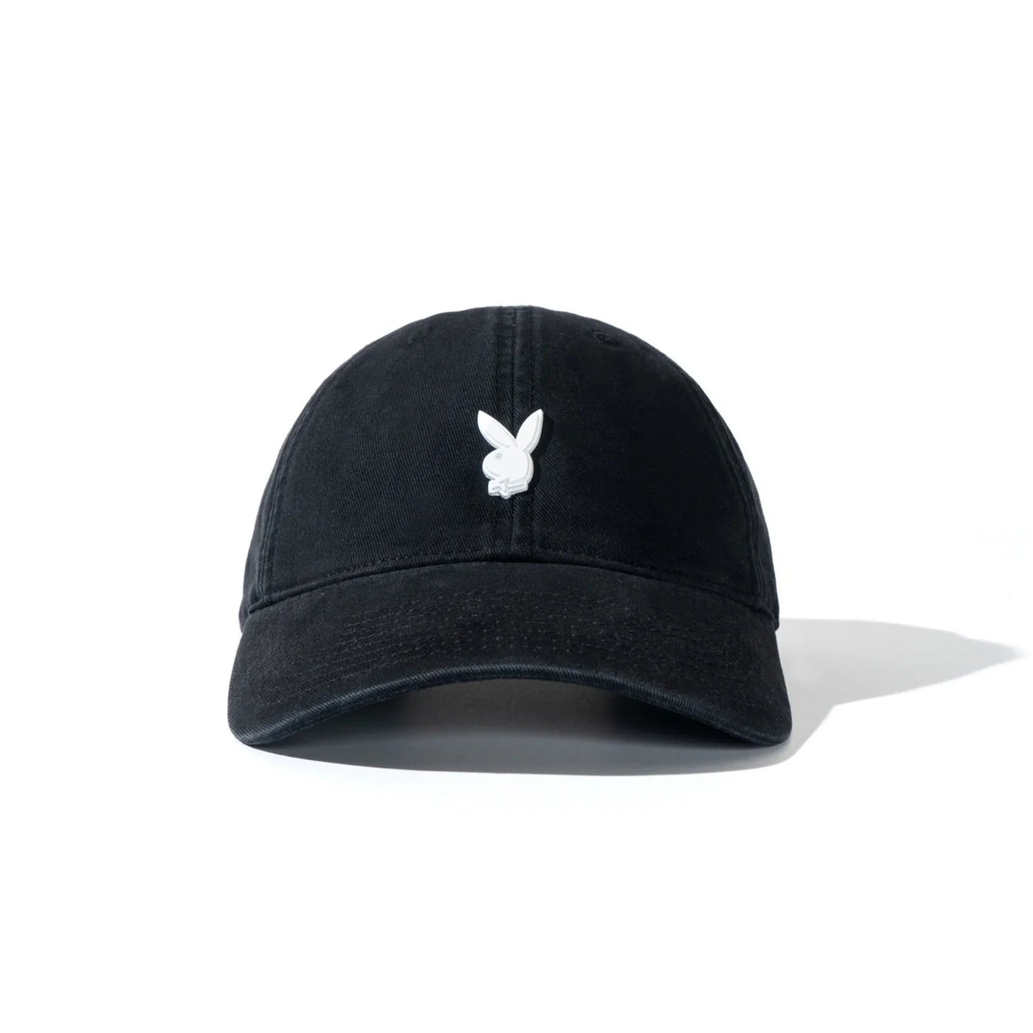 Black dad hat with metal rabbit head pin on front, minimalist streetwear accessory