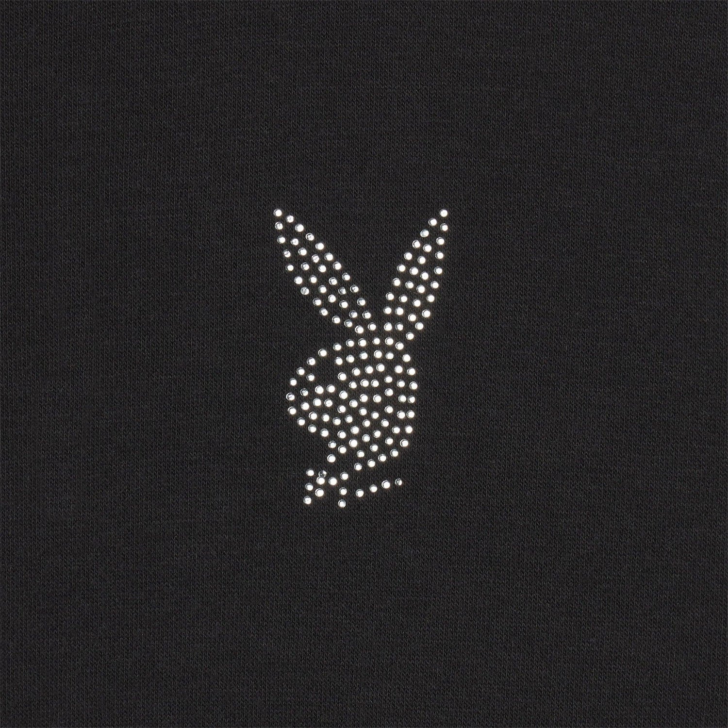 Black fabric with rhinestone bunny head logo design, closeup view