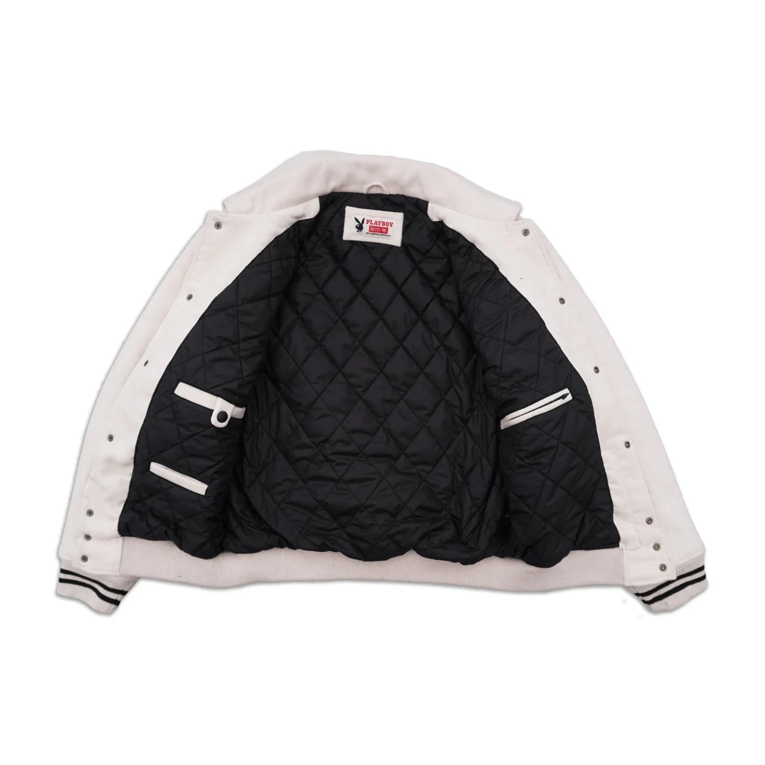 Open white varsity jacket with black quilted lining and striped cuffs on white background