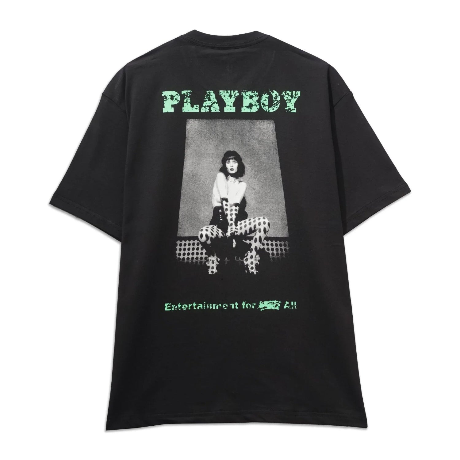 Black graphic tee with vintage-style female figure, green PLAYBOY text, and polka dot accents.