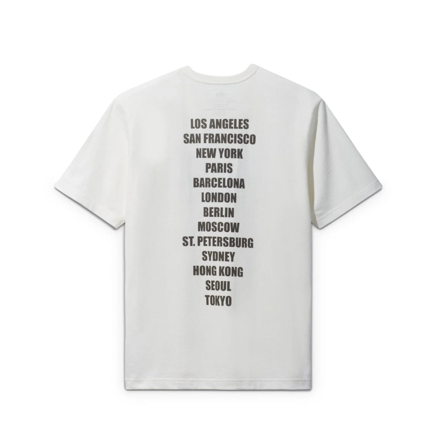 White t-shirt with a list of major city names printed vertically on the back.
