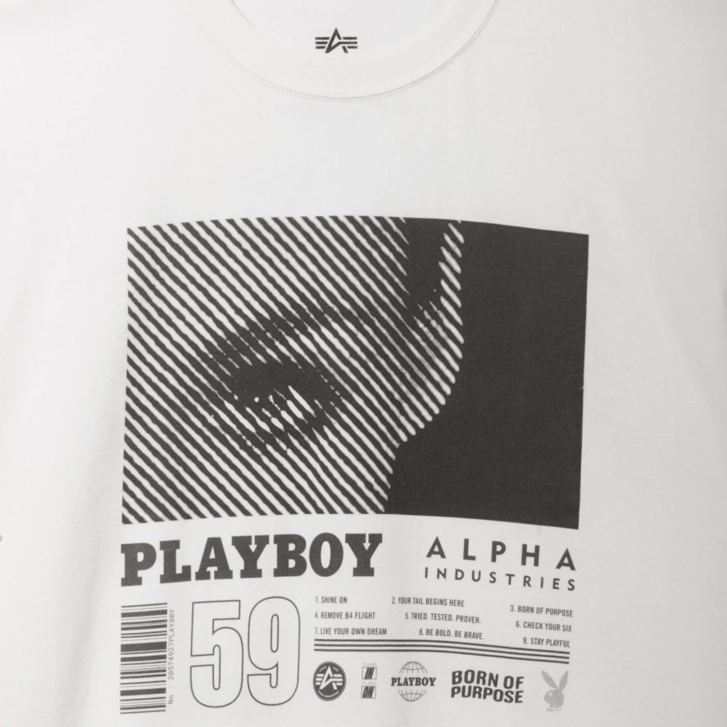 White graphic t-shirt with black striped eye design and PLAYBOY ALPHA INDUSTRIES text on front