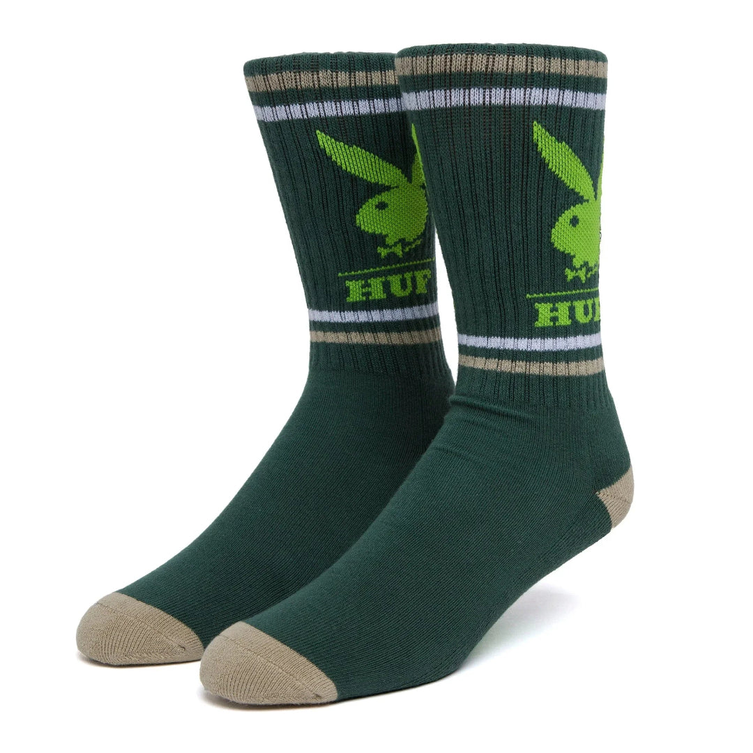 Green crew socks with yellow rabbit logo, striped cuffs, and contrasting heels and toes