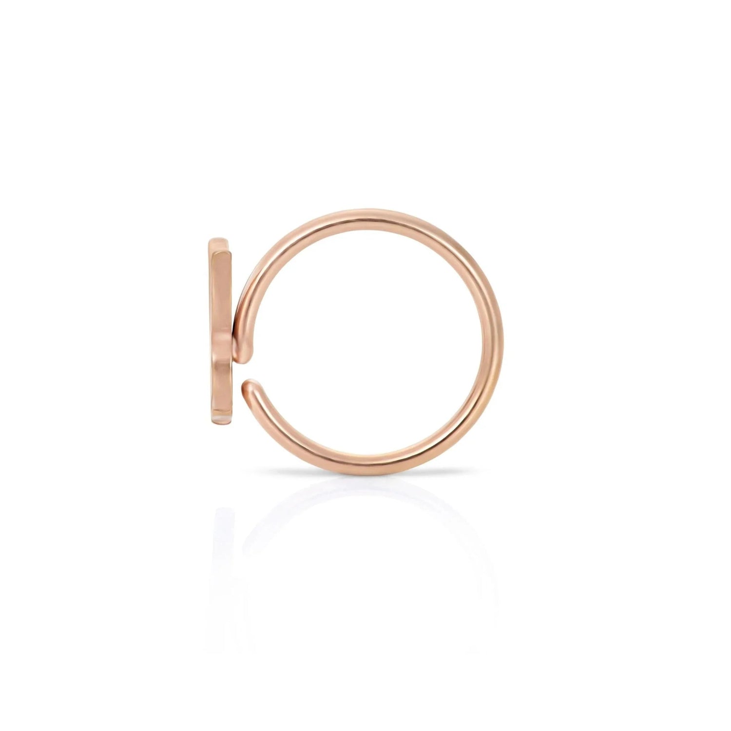 Rose gold rabbit head nose ring on white background, minimalist jewelry accessory