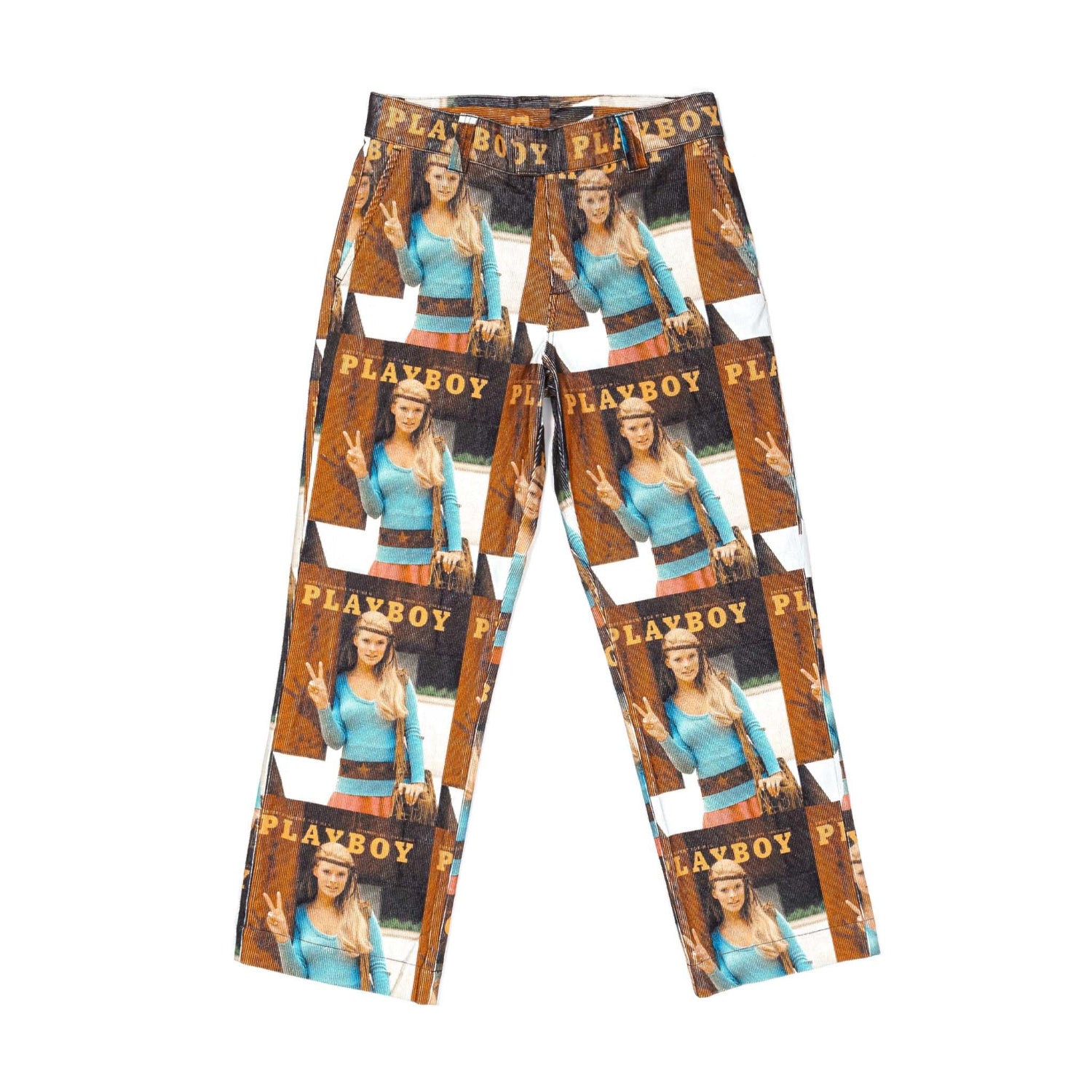 Colorful pants featuring repeated 1970 magazine cover graphic print with peace sign woman