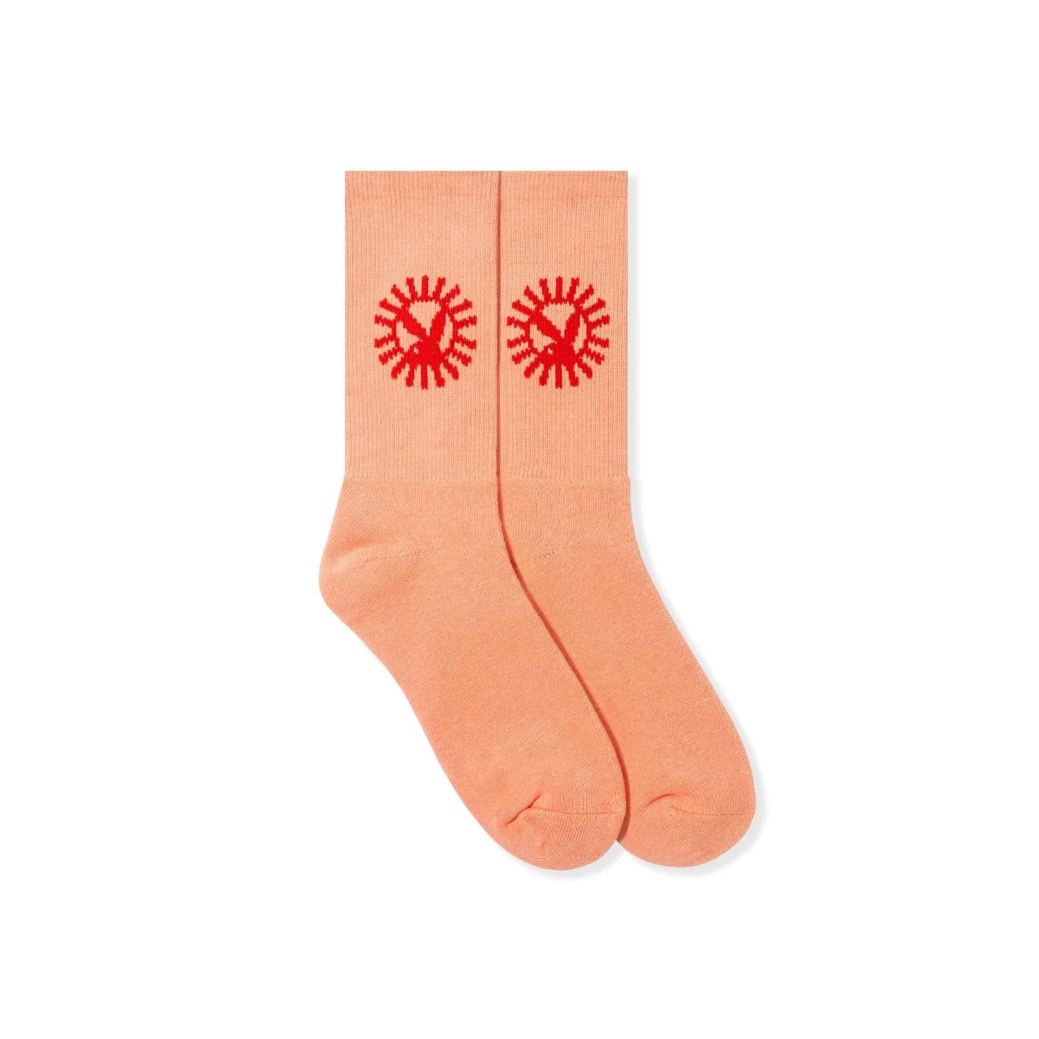 Peach crew socks with red sun and bunny ear pattern, laid flat on white background