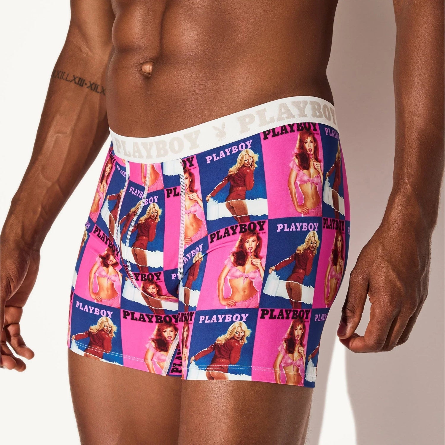 Men's boxer briefs with colorful vintage magazine cover print and PLAYBOY logo waistband