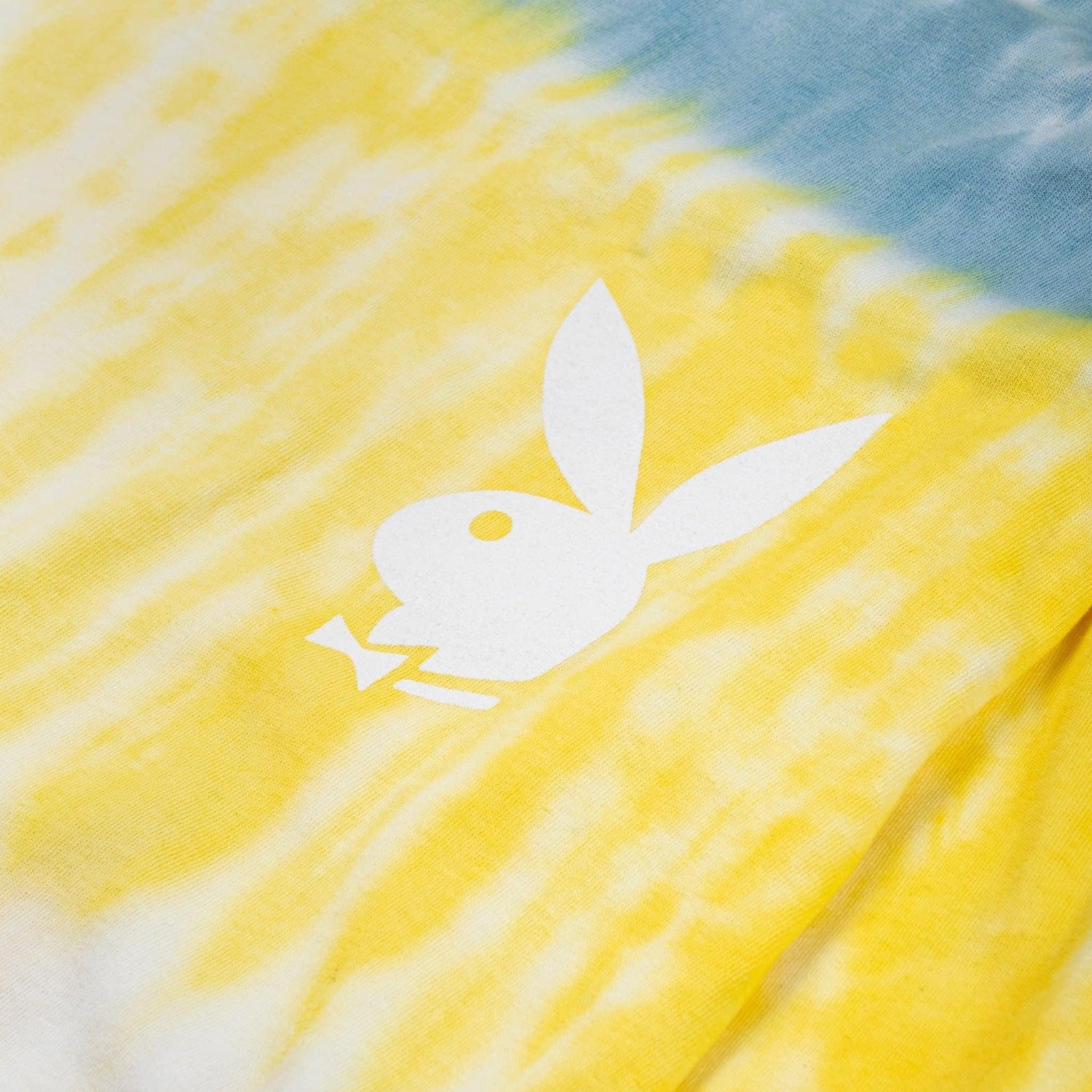 Yellow and blue tie-dye long sleeve t-shirt with white bunny logo graphic on front