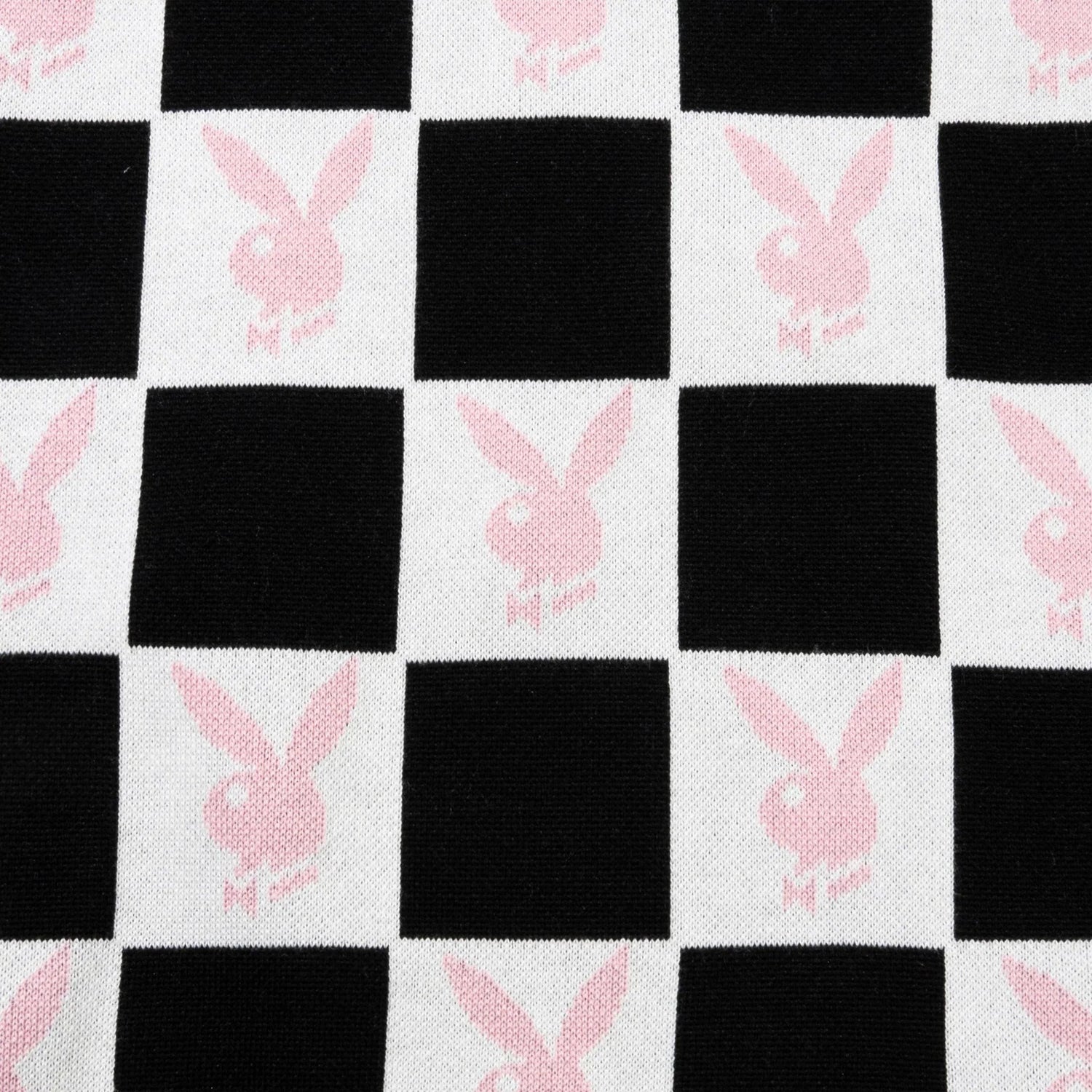 Black and white checkerboard fabric with pink bunny logos and text design