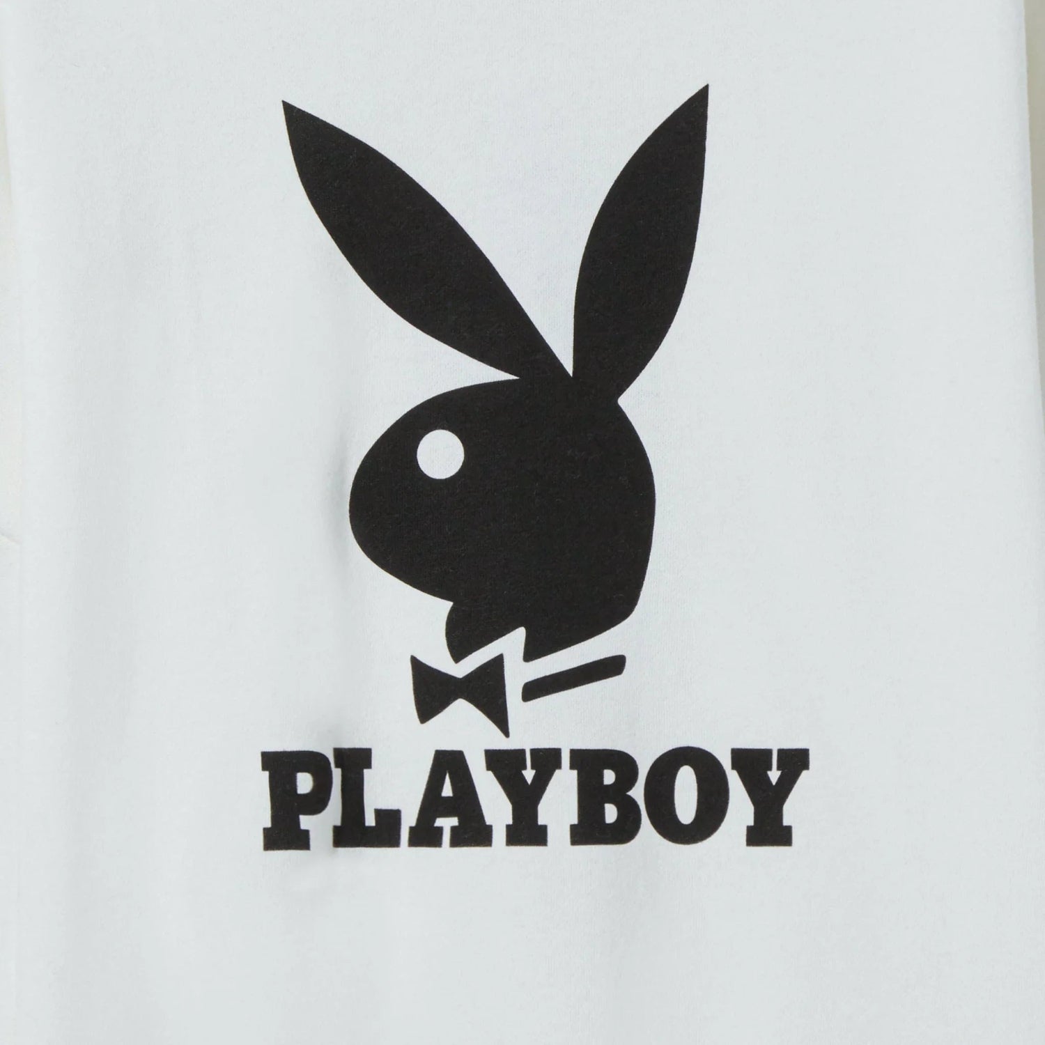 White crewneck sweatshirt with black rabbit head logo and bold PLAYBOY text print on front